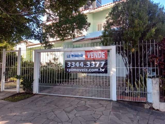 Casa com 3 quartos à venda na Vitorio Francisco Giordani, 210, Jardim Planalto, Porto Alegre, 194 m2 por R$ 990.000