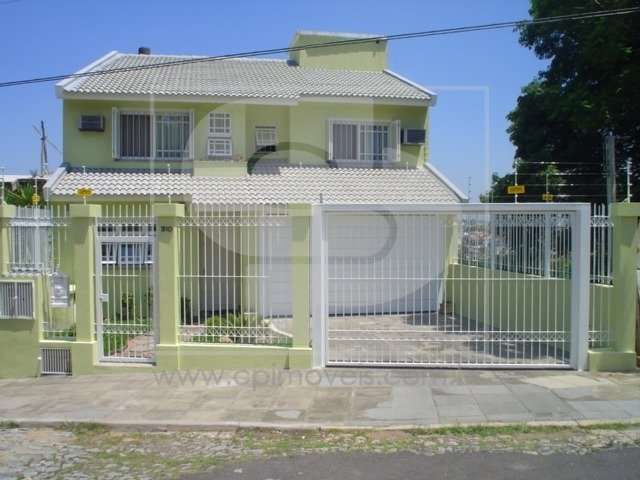 Casa com 4 quartos à venda na Rua Pedro A. A. de Freitas Filho, 310, Jardim Itu Sabará, Porto Alegre, 335 m2 por R$ 990.000