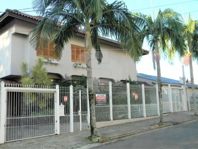 Casa com 3 quartos à venda na Avenida Montreal, 356, Jardim Lindóia, Porto Alegre, 410 m2 por R$ 1.700.000