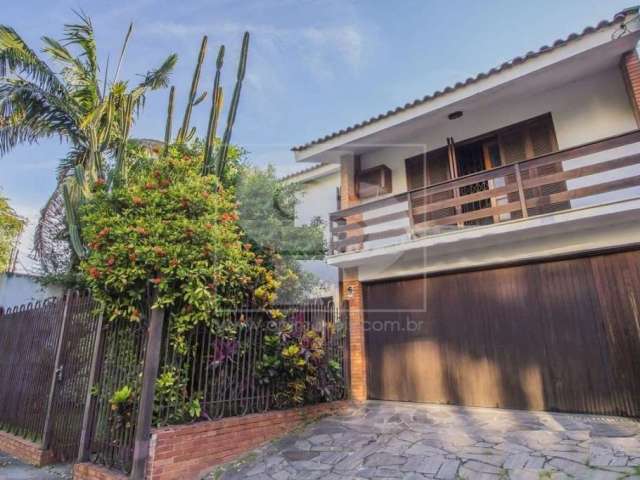 Casa com 4 quartos à venda na Avenida Panamericana, 940, Jardim Lindóia, Porto Alegre, 303 m2 por R$ 1.850.000