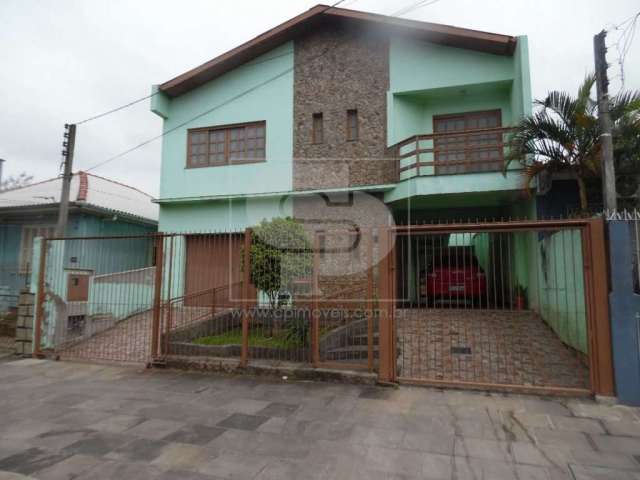 Casa com 4 quartos à venda na Rua Edmundo Bastian, 516, Cristo Redentor, Porto Alegre, 307 m2 por R$ 830.000