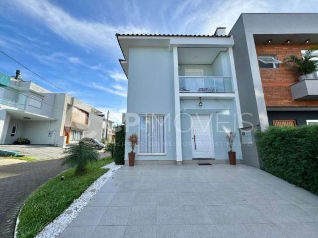 Casa em condomínio fechado com 3 quartos à venda na Rua Edmundo Figueira da Silva, 26, Passo das Pedras, Porto Alegre, 130 m2 por R$ 899.000