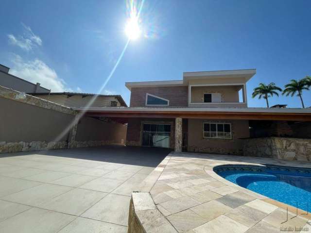 Casa com piscina alto padrão no Florida em Praia Grande.