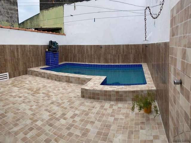 Casa com 3 quartos à venda na Rua Vinte e Três de Maio, 829, Vila Mirim, Praia Grande, 136 m2 por R$ 610.000