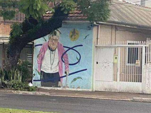 No bairro Rio Branco, casa em terreno de 165 m².