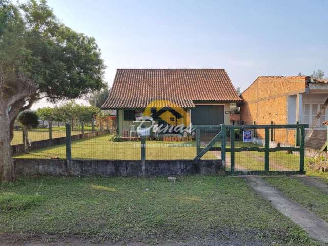 Casa de madeira no jardim atlântico