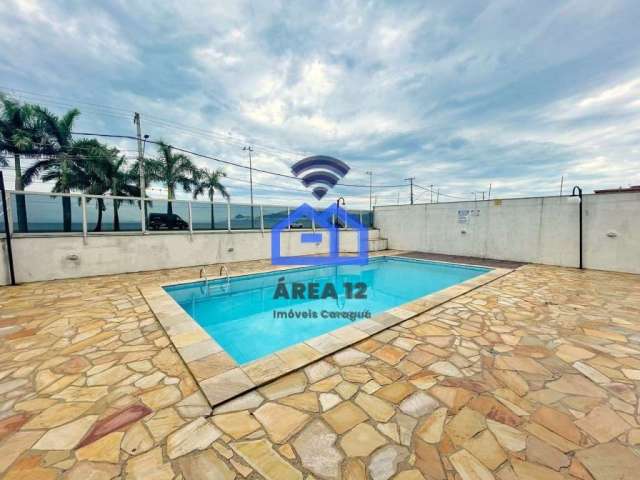 Apartamento à Venda no bairro do Massaguaçu, com 2 dormitórios e sacada com vista pro mar, banheiro