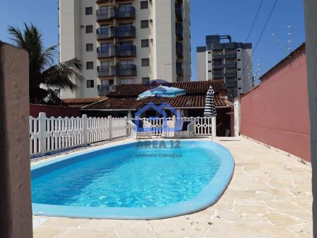 Casa à venda no bairro Martim de Sá - 3 dormitórios com ar condicionado, 3 banheiros, cozinha, área