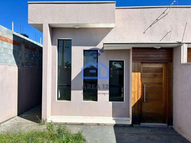 Casa à venda no Loteamento Estância Mirante de Caraguatatuba, SP - Acabamento moderno com 03 dormit