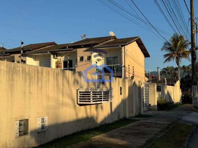 Sobrado em condomínio para locação no bairro Porto Novo em Caraguatatuba, SP - 69m², 2 suítes, lava