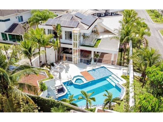 Vende casa Jardim Acapulco, Guarujá, alto padrão, 680m², 6 suítes, piscina cinematográfica, área gourmet, R$4.400.000