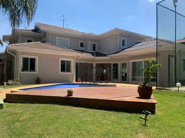 Casa com 5 suítes à venda, 448 m² por R$ 2.980.000 - Condomínio Portal do Lago - Valinhos/SP