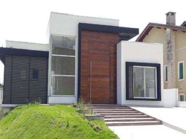 CASA VENDA CONDOMÍNIO ARUÃ EXCELENTE IMÓVEL com A/T 500m² e A/C 400m² distribuídos