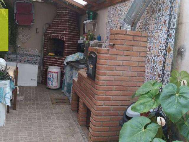 Casa com 3 dormitórios à venda, 135 m² por R$ 600.000 - Maracanã - Praia Grande/SP