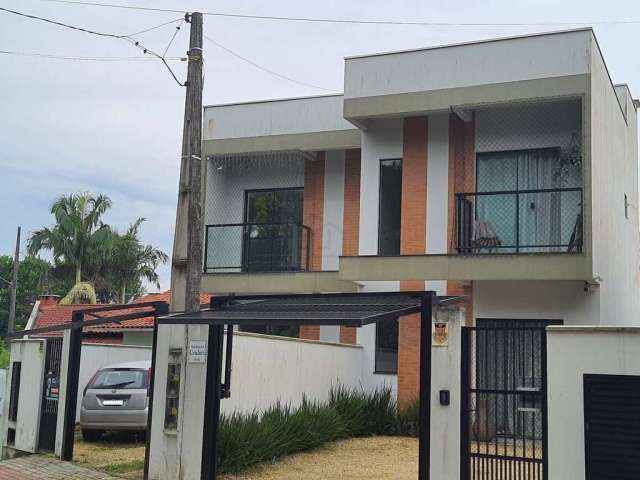 CASA SOBRADO NO BAIRRO SANTA TEREZINHA COM 72,50m², DUAS SUÍTES, DUAS VAGAS DE GARAGEM E ESPAÇO NOS FUNDOS