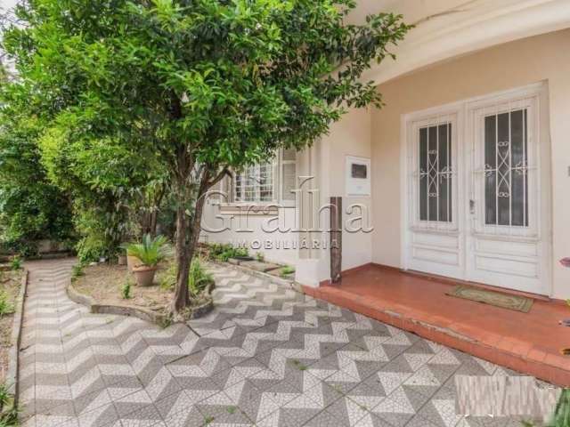 Casa com 4 quartos à venda na Rua Doutor Voltaire Pires, 224, Santo Antônio, Porto Alegre por R$ 650.000