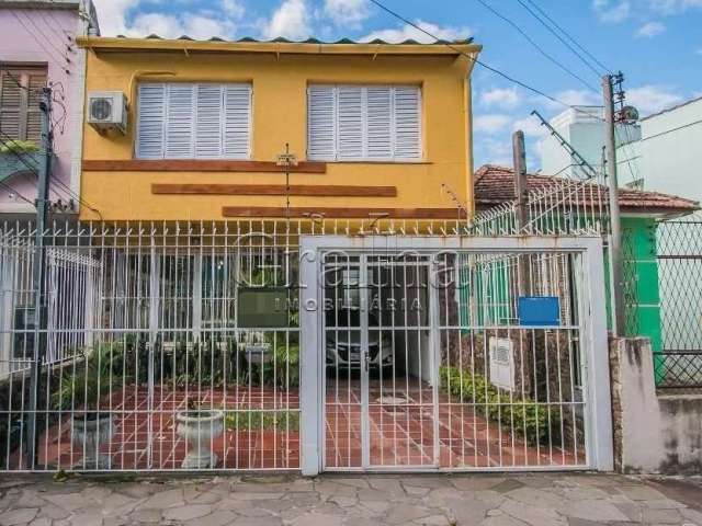 Casa com 4 quartos à venda na Rua São Francisco, 724, Santana, Porto Alegre por R$ 830.000