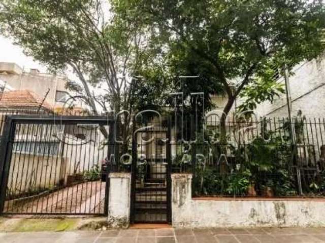 Casa com 3 quartos à venda na Rua Eudoro Berlink, 204, Auxiliadora, Porto Alegre por R$ 1.250.000