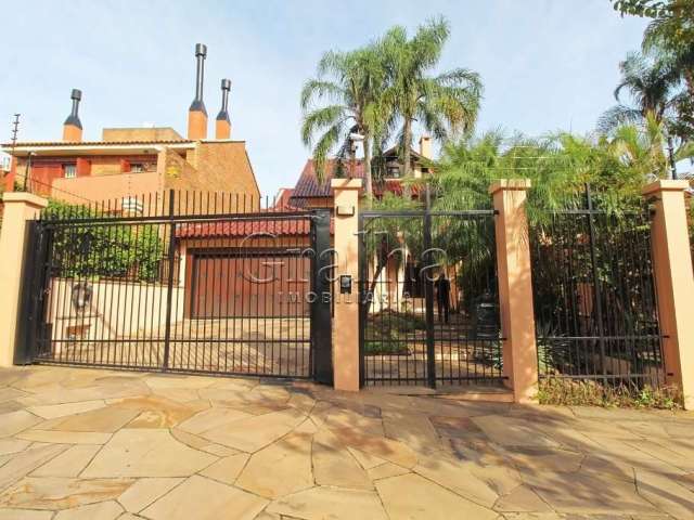 Casa com 4 quartos à venda na Rua Doutor Barbosa Gonçalves, 610, Chácara das Pedras, Porto Alegre por R$ 2.990.000