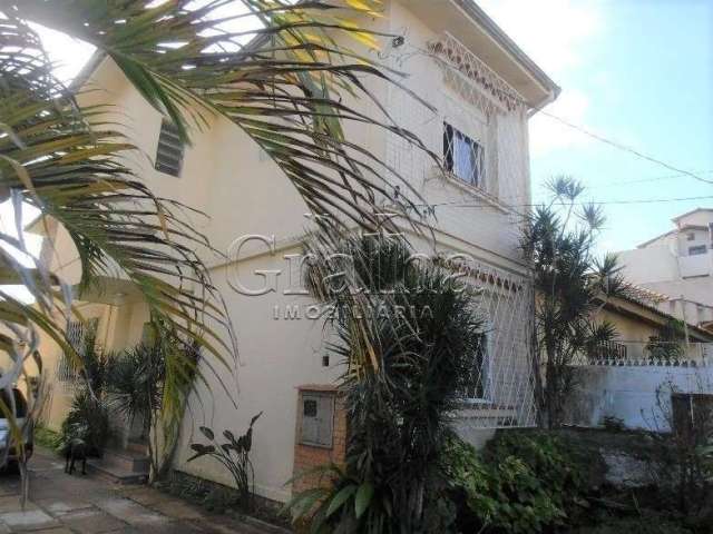 Casa com 3 quartos à venda na Rua Visconde do Herval, 1248, Menino Deus, Porto Alegre por R$ 750.000