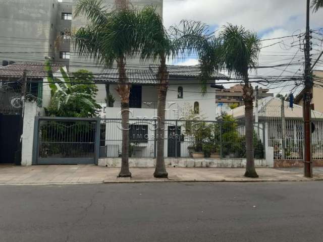 Casa com 4 quartos à venda na Rua Barão de Cerro Largo, 34, Menino Deus, Porto Alegre por R$ 1.600.000