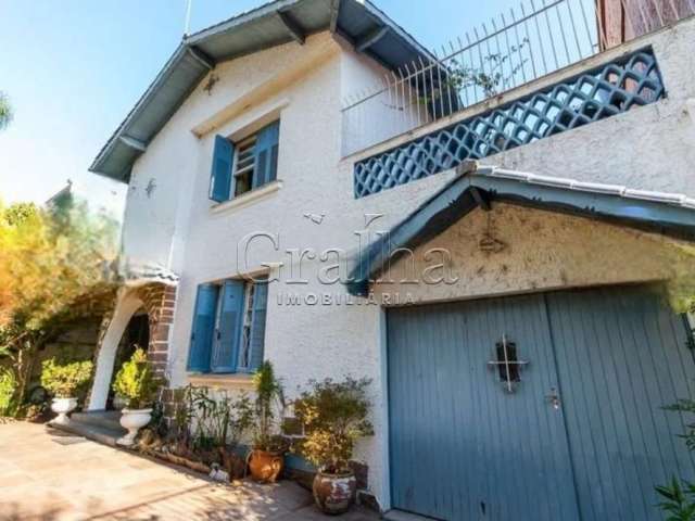 Casa com 3 quartos à venda na Rua Afonso Pena, 21, Azenha, Porto Alegre por R$ 980.000