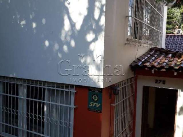 Casa com 3 quartos à venda na Rua Artigas, 275, Petrópolis, Porto Alegre por R$ 1.118.000