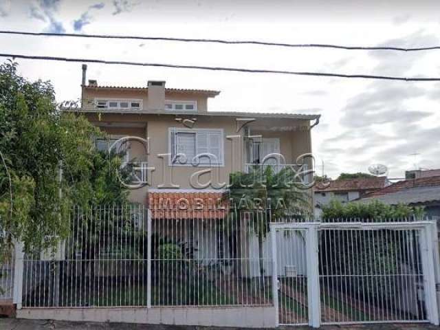 Casa com 4 quartos à venda na Rua Pedro Pereira de Souza, 117, Partenon, Porto Alegre por R$ 1.064.000