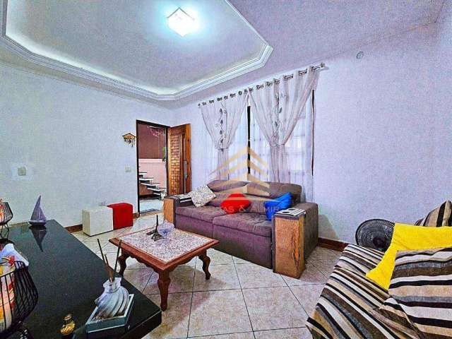 Vendo lindo sobrado de 128m² com 2 quartos, 2 banheiros, terraço com churrasqueira e 2 vagas de garagem próximo ao Shopping Maia.