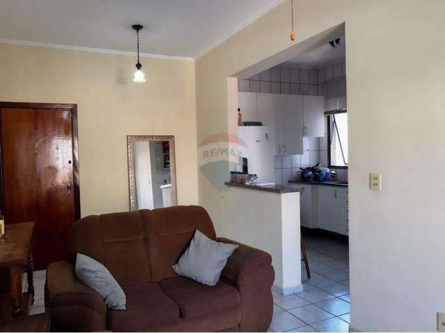 Apartamento no Centro: 2 Quartos, Sala 2 Ambientes, Sacada, Cozinha Planejada, 2 Banheiros, Portaria 24h, 1 Vaga Coberta, 65m² de Área Útil