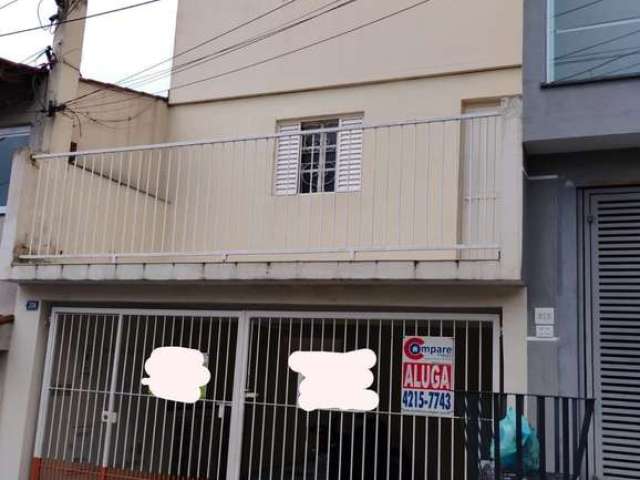 Casa para locação com garagem coberta e água inclusa no valor, Parque Continental, Guarulhos, SP