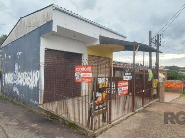 Imóvel de esquina, localizado no bairro Campo Novo. Terreno com duas lojas de frente para Av. Cristiano Kraemer, ambas alugadas, medindo 24m2 cada uma. Na sequência segue edificação de uma casa térrea