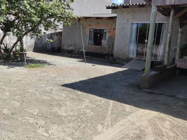 Terreno com casa de 3 quartos