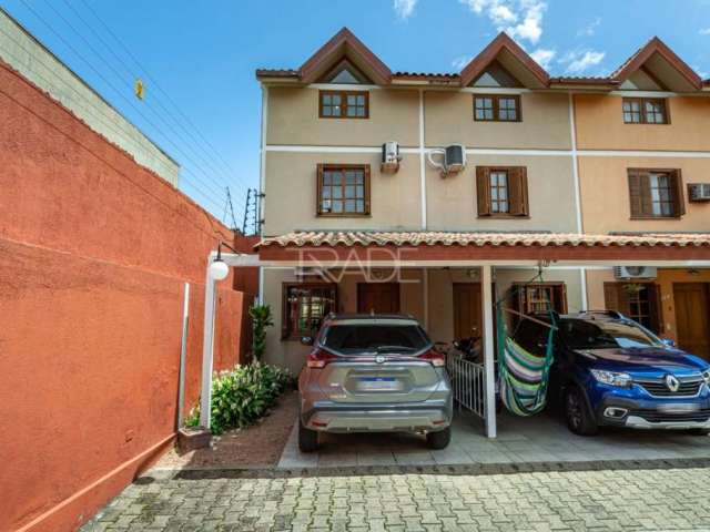 Casa em condomínio fechado com 3 quartos à venda na Rua Sílvio Silveira Soares, 2406, Camaquã, Porto Alegre por R$ 350.000