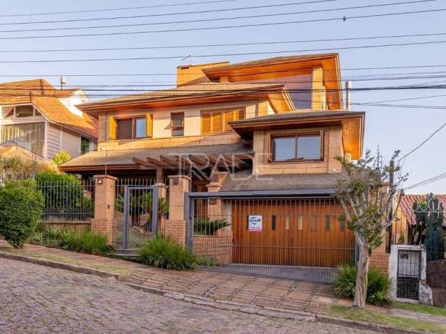 Casa com 4 quartos à venda na Rua Genny Zachia Stephanou, 43, Ipanema, Porto Alegre por R$ 2.290.000