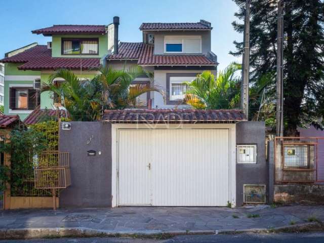 Casa com 3 quartos à venda na Travessa Nova Trento, 211, Tristeza, Porto Alegre por R$ 1.280.000