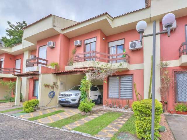 Casa em condomínio fechado com 3 quartos à venda na Rua Doutor Armando Barbedo, 1161, Tristeza, Porto Alegre por R$ 1.020.000