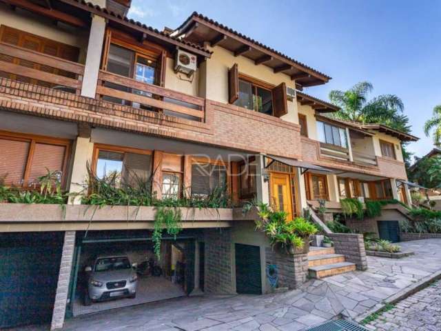 Casa em condomínio fechado com 3 quartos à venda na Rua Ernesto Paiva, 46, Tristeza, Porto Alegre por R$ 1.490.000