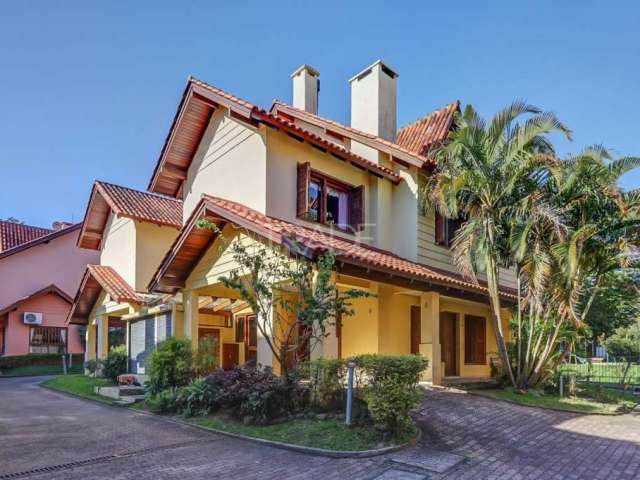 Casa em condomínio fechado com 3 quartos à venda na Luís Felipe Monmany, 101, Guarujá, Porto Alegre por R$ 650.000