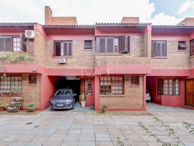 Casa em condomínio fechado com 3 quartos à venda na Avenida Coronel Marcos, 1608, Pedra Redonda, Porto Alegre por R$ 850.000