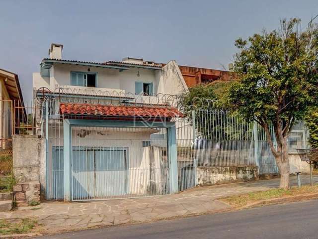 Casa com 4 quartos à venda na Padre João Batista Reus, 1767, Tristeza, Porto Alegre por R$ 690.000