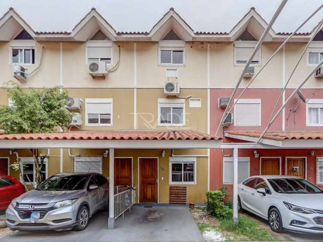 Casa em condomínio fechado com 3 quartos à venda na Rua Afonso Arinos, 145, Camaquã, Porto Alegre por R$ 399.900