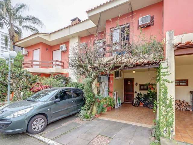 Casa em condomínio fechado com 3 quartos à venda na Rua Doutor Armando Barbedo, 1161, Tristeza, Porto Alegre por R$ 750.000