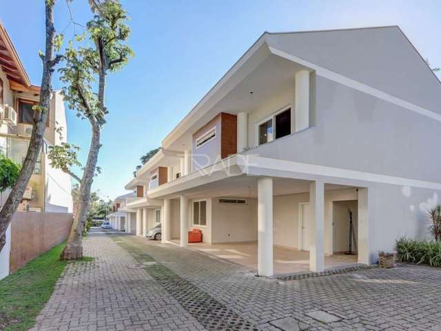 Casa em condomínio fechado com 3 quartos à venda na Avenida Coronel Marcos, 1460, Pedra Redonda, Porto Alegre por R$ 550.000