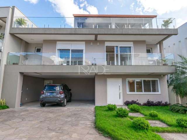 Casa em condomínio fechado com 4 quartos à venda na Rua Ivo Walter Kern, 599, Hípica, Porto Alegre por R$ 1.860.000