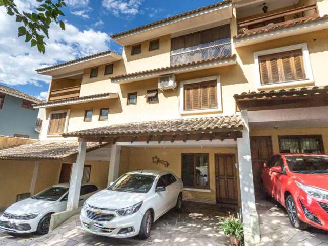 Casa em condomínio fechado com 3 quartos à venda na Rua General Rondon, 1489, Tristeza, Porto Alegre por R$ 580.000