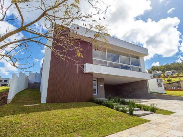 Casa em condomínio fechado com 3 quartos à venda na Estrada das Três Meninas, 1501, Vila Nova, Porto Alegre por R$ 2.100.000