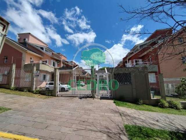 Casa em condomínio fechado com 3 quartos para alugar na Avenida Jacuí, 903, Cristal, Porto Alegre por R$ 2.800