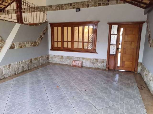 Casa com 3 dormitórios à venda, 123 m² por R$ 570.000,00 - Maracanã - Praia Grande/SP