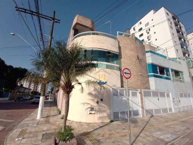 Casa com 3 dormitórios à venda, 264 m² por R$ 895.000,00 - Tupi - Praia Grande/SP